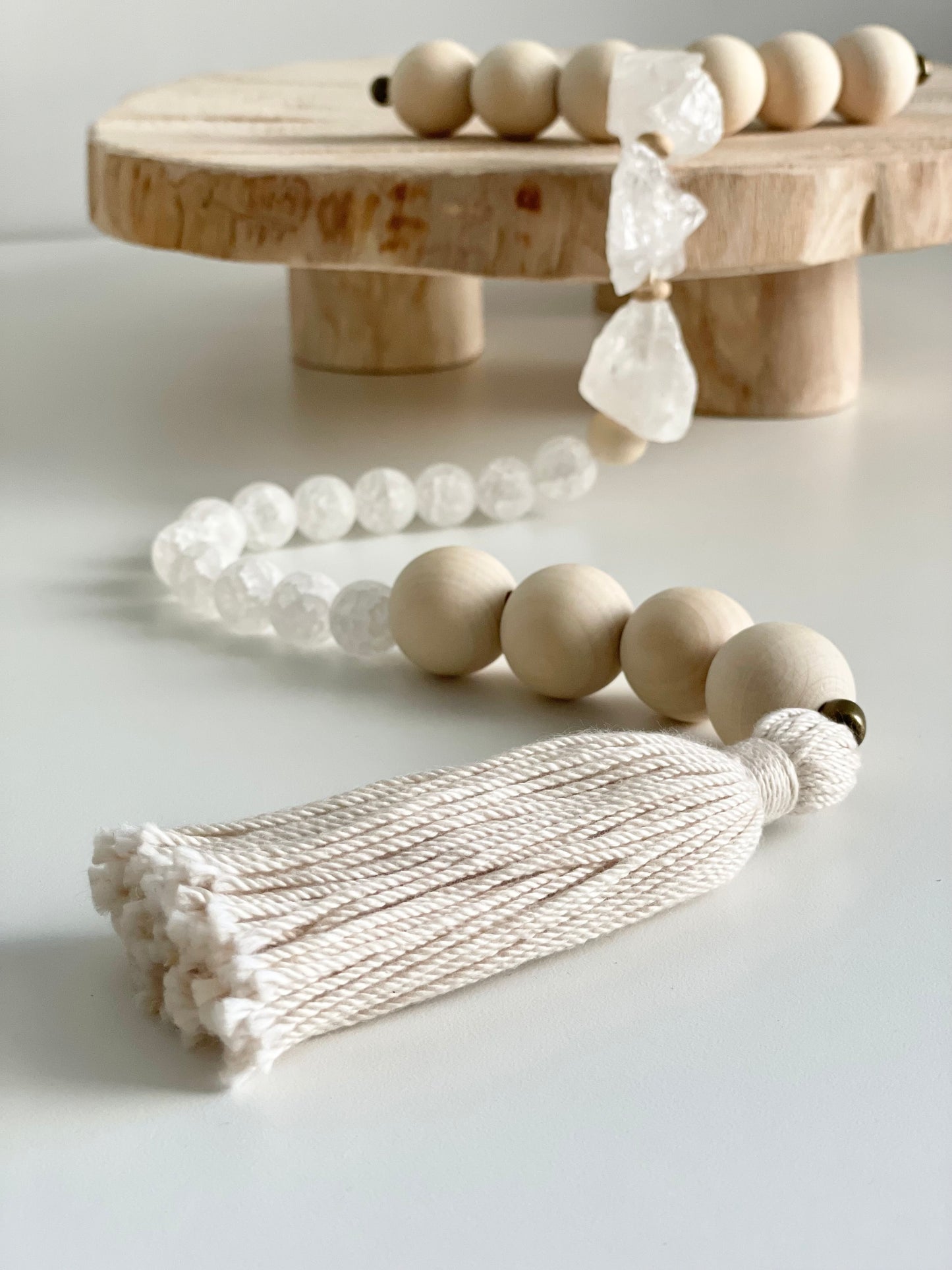 Long string of wood and quartz beads for intentional breathing