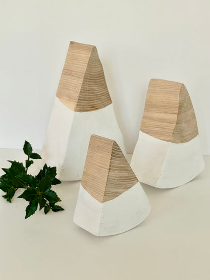 Minimalist holiday tree set with handmade wooden trees with a white base 