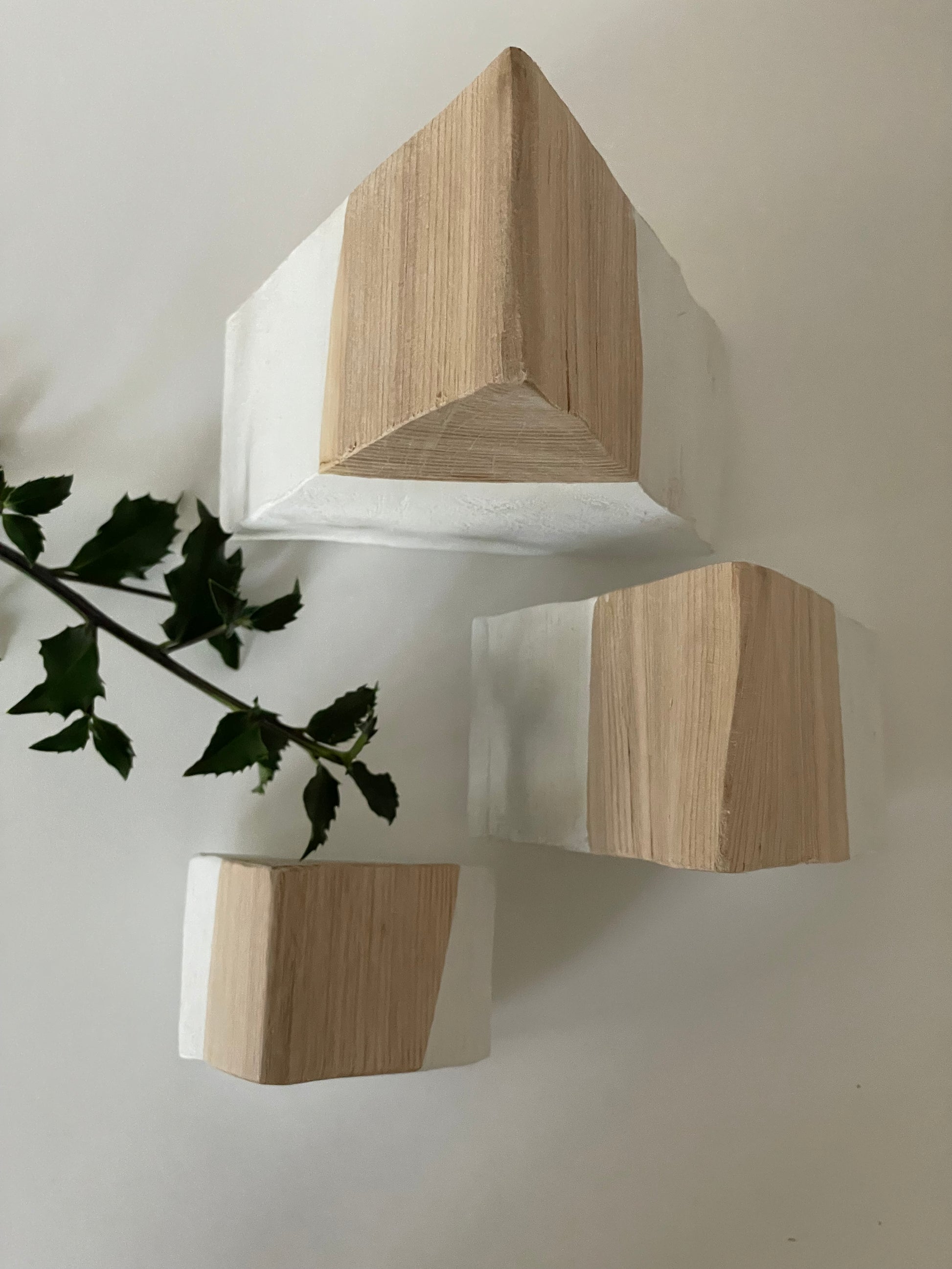 Minimalist holiday tree set with handmade wooden trees with a white base 